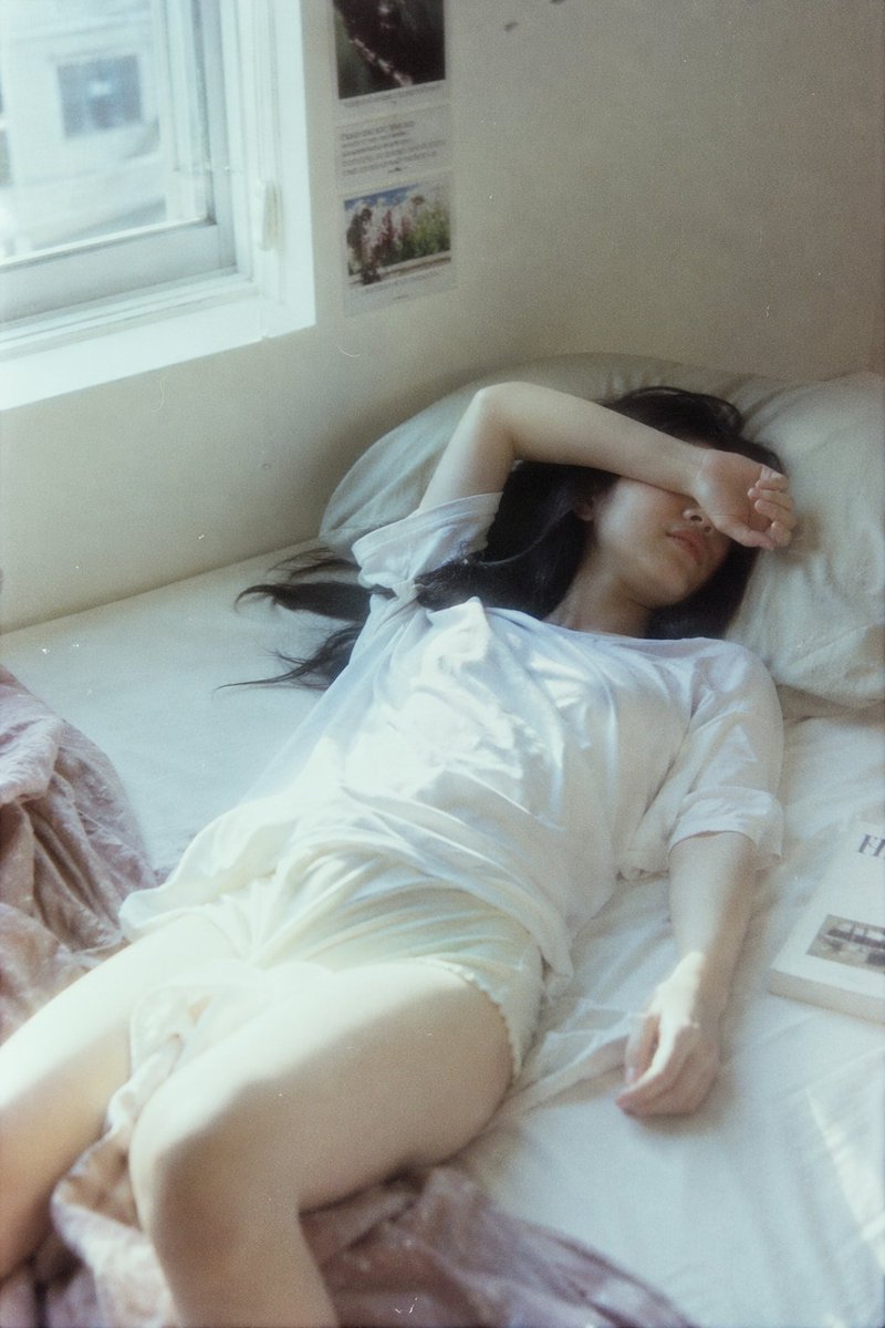 Japanese negative film aesthetic, lazy summer indoor scene, soft…