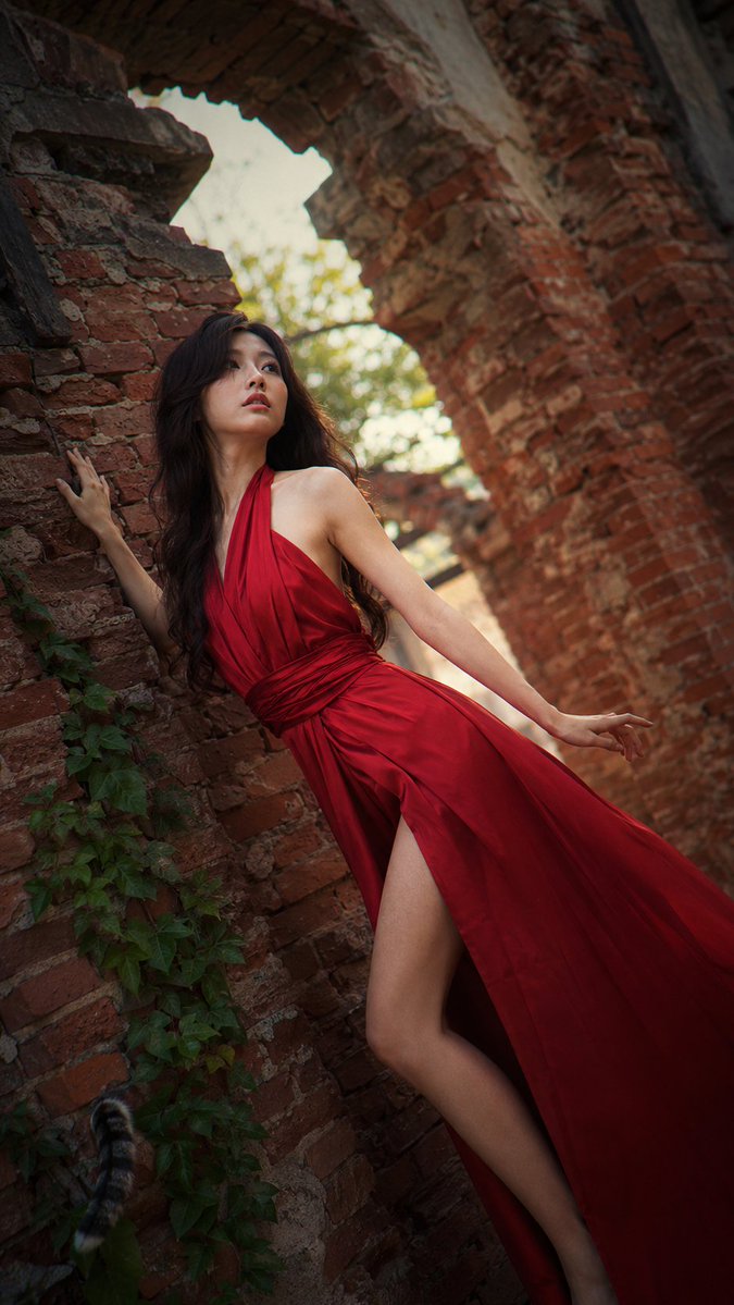 Crimson gown brick archway