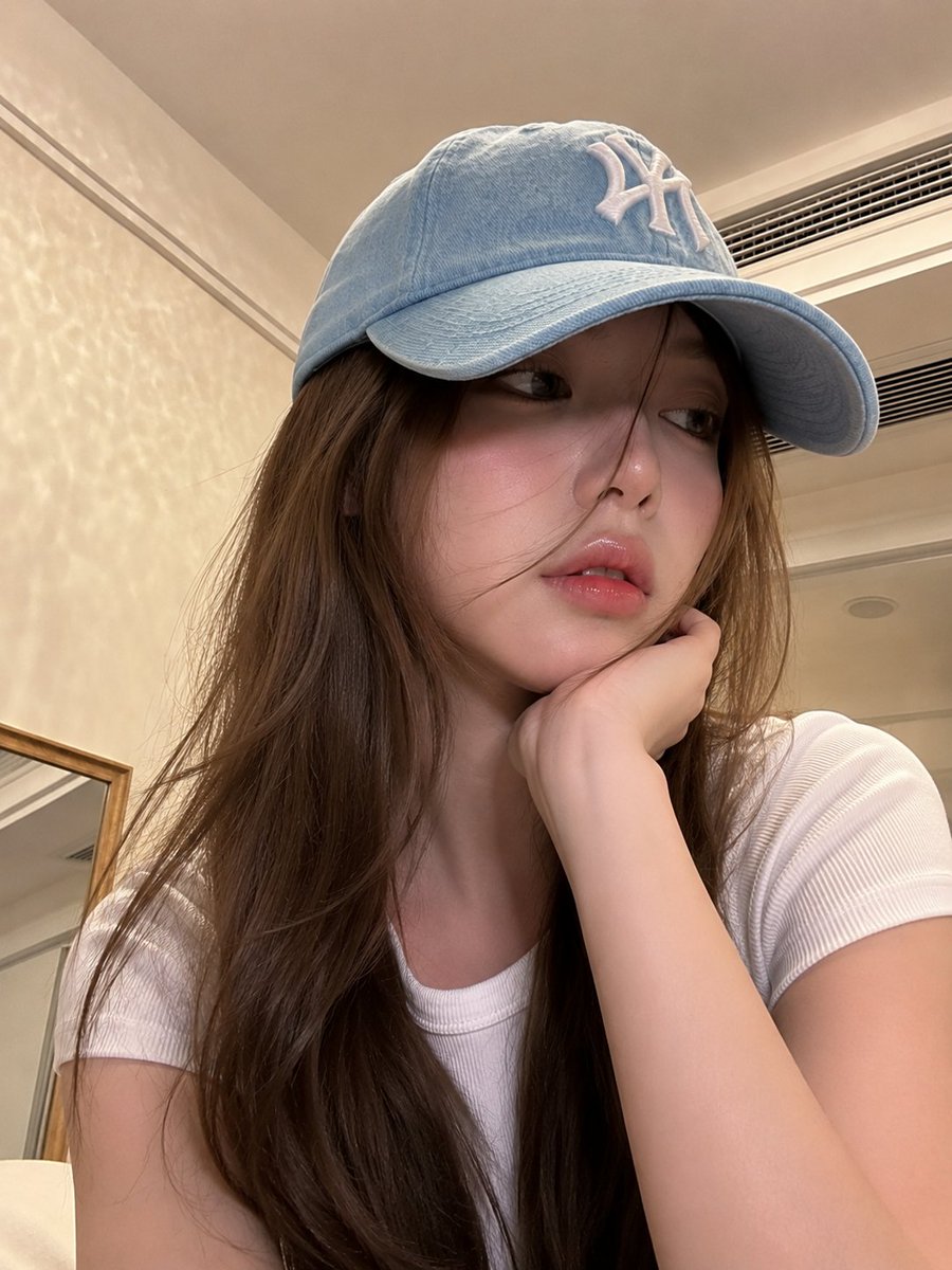 Baseball cap bedroom selfie