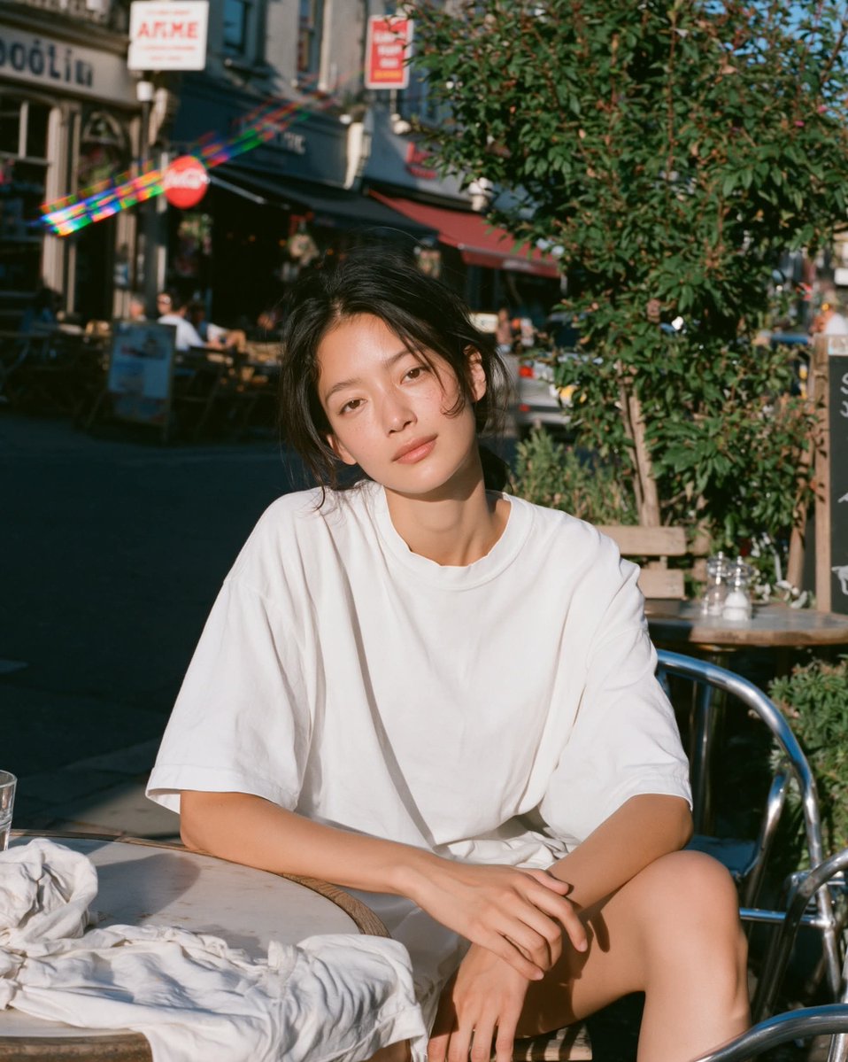 Sunlit cafe terrace film portrait