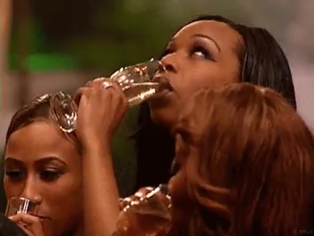Elegant Woman Sips Champagne