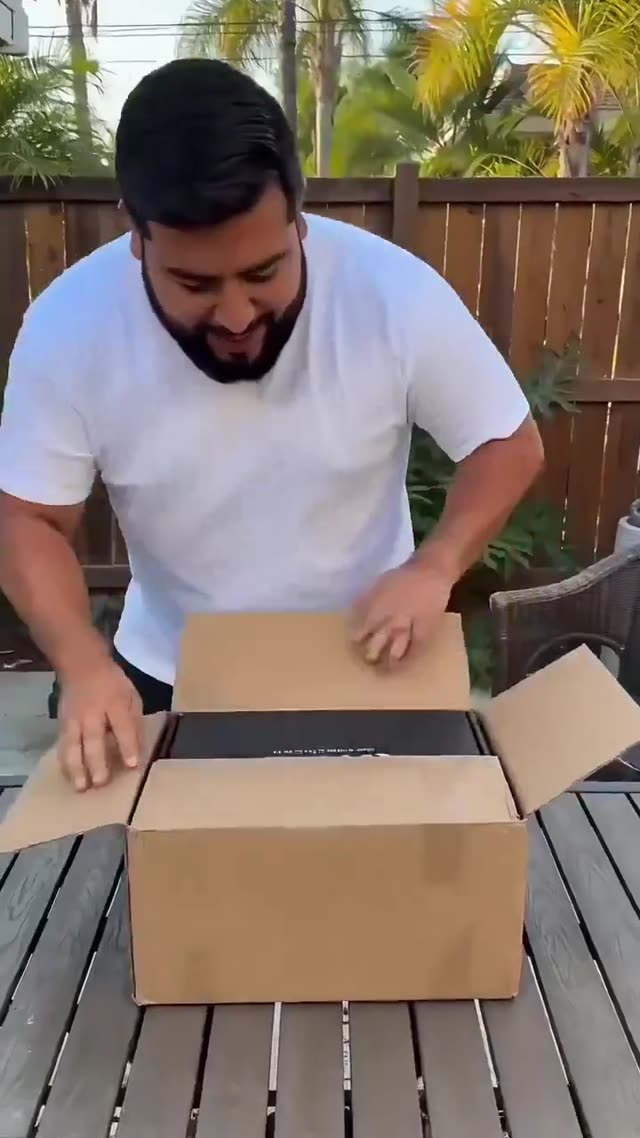 Man Unboxes and Reviews Sports Hoodies