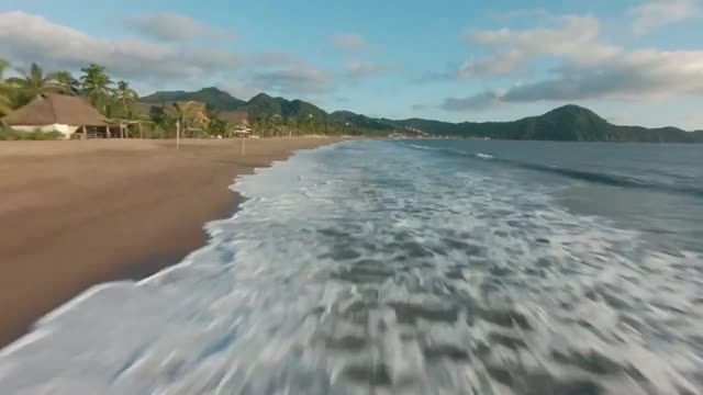 Tropical Beach Waves Drone Flight