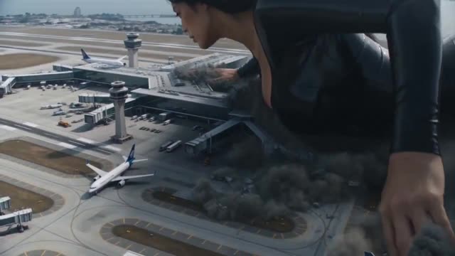 Giant Woman Destroys Airport Tarmac