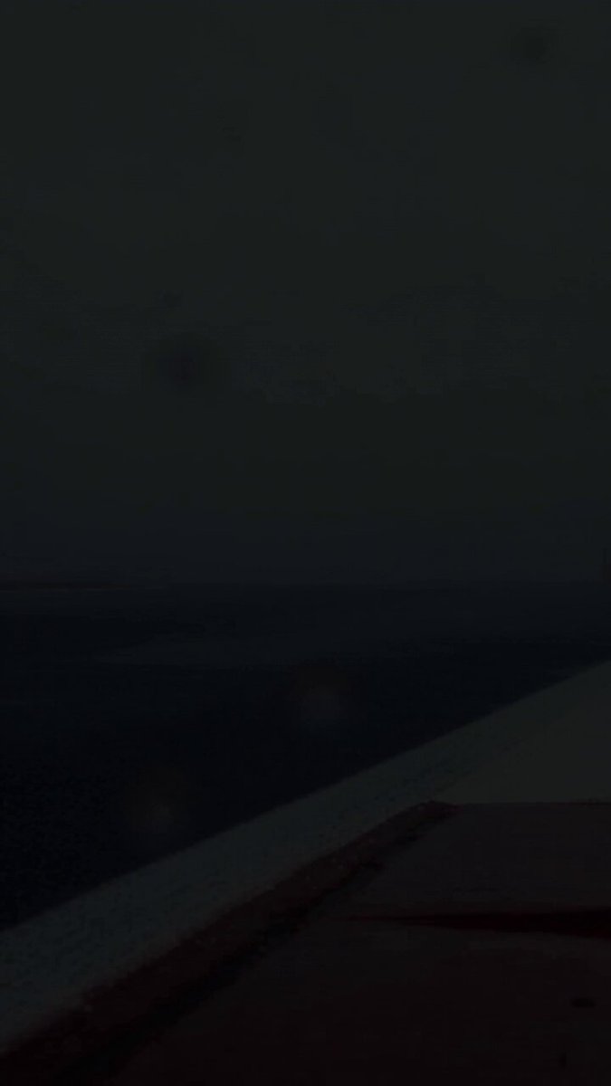Realistic rainy commercial scene with car windshield