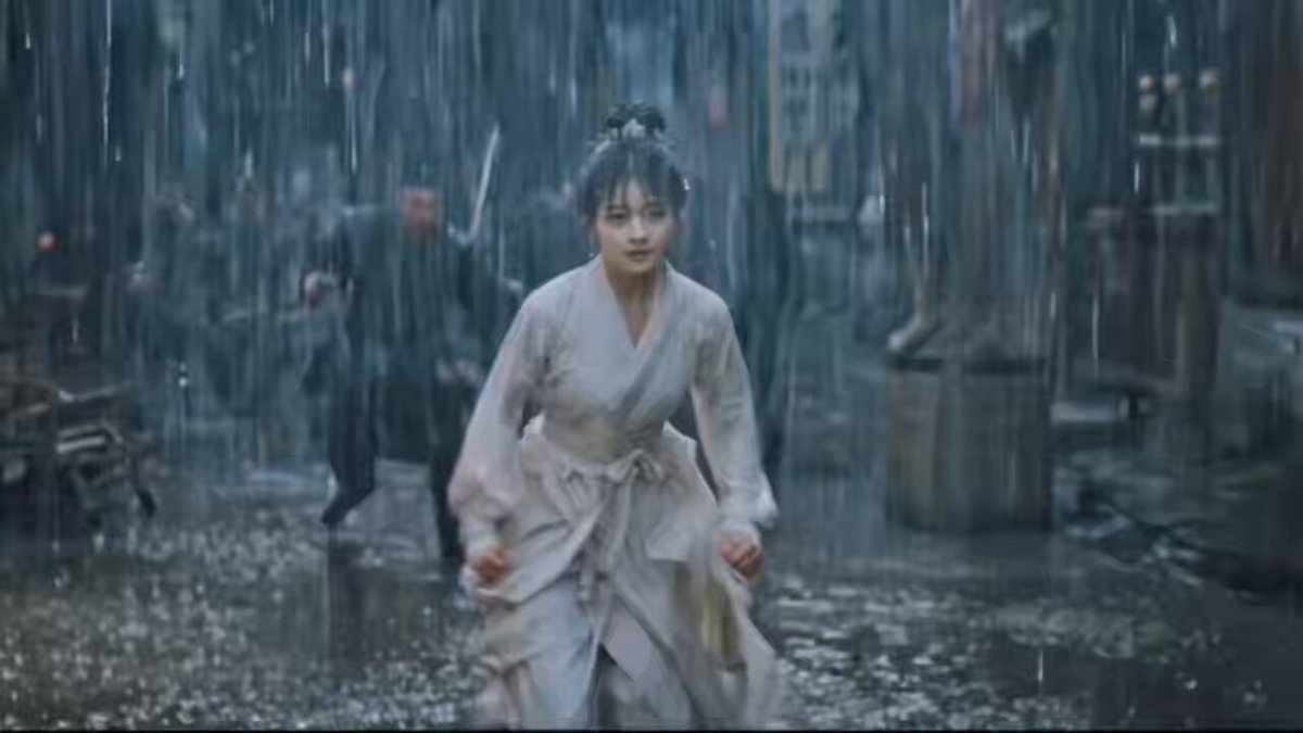 Rainy street martial arts fight sequence