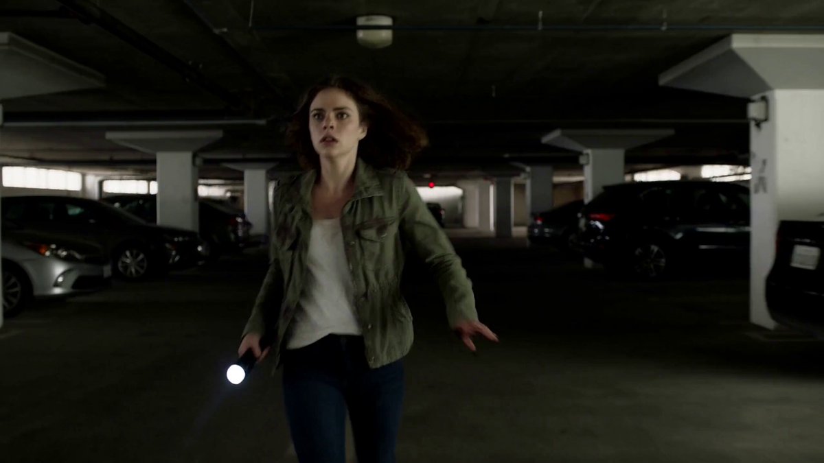 Live-action zombie horror sequence in a parking garage