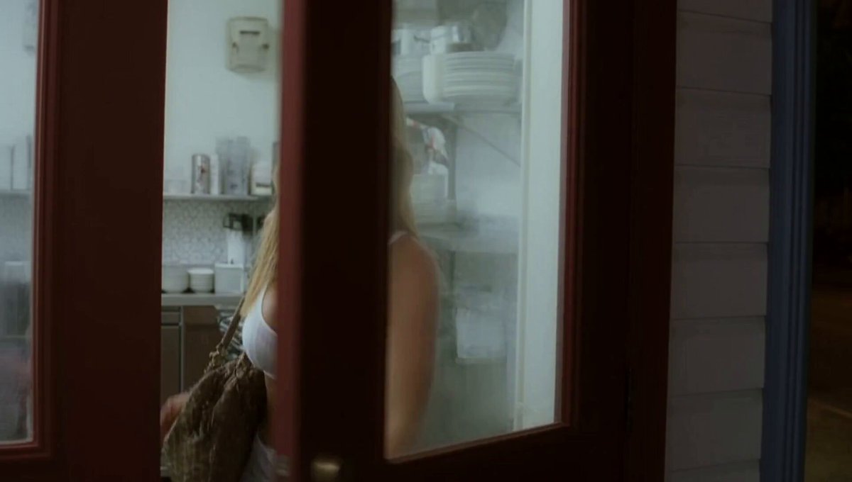 Lucy stepping out of a diner