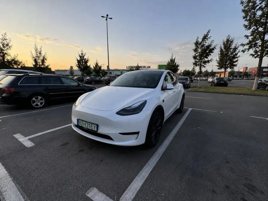 Realistic iPhone Photo of Tesla Model Y