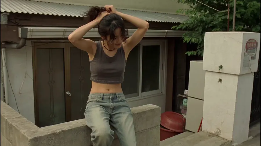 Young Korean woman in residential neighborhood